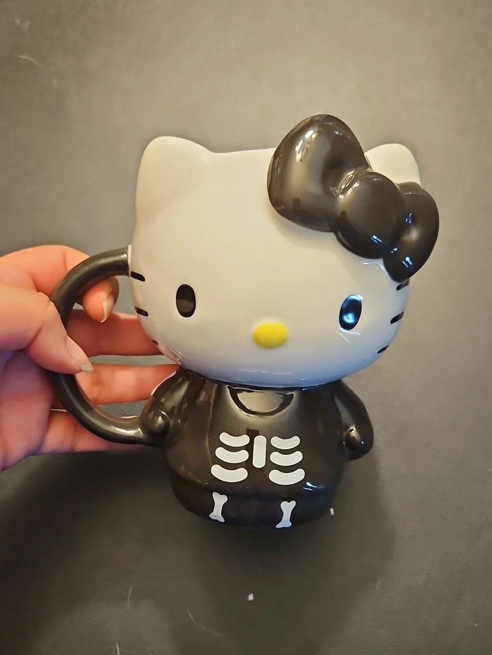 Hello Kitty Black & White Skeleton Mug with Yellow Nose